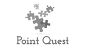 An image of puzzle pieces above the text 'Point Quest.'