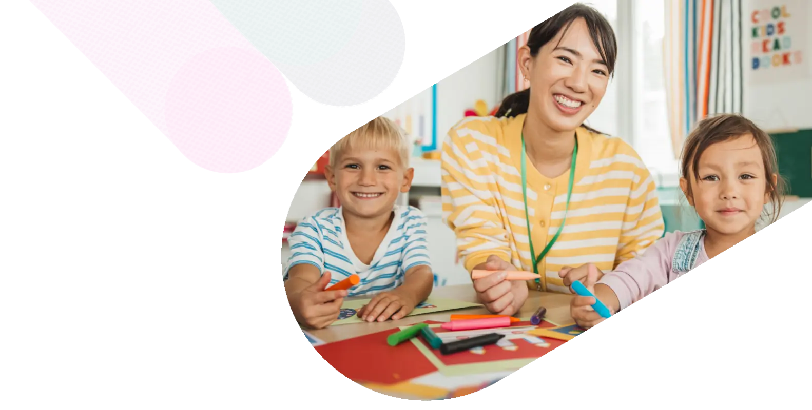 a teacher smiling in a classroom with children